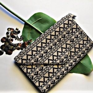 Tribal style clutch